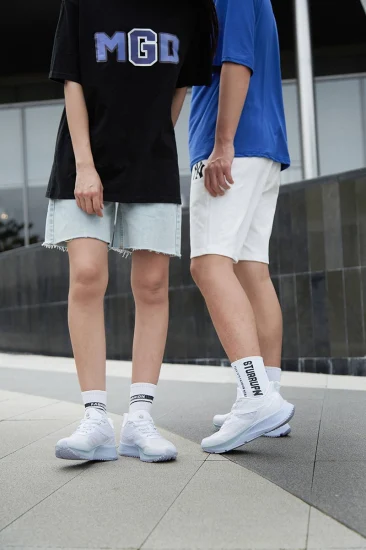 Venta al por mayor de zapatillas de deporte de punto con mosca personalizadas, calzado de moda para hombres y mujeres, zapatos de estilo para caminar